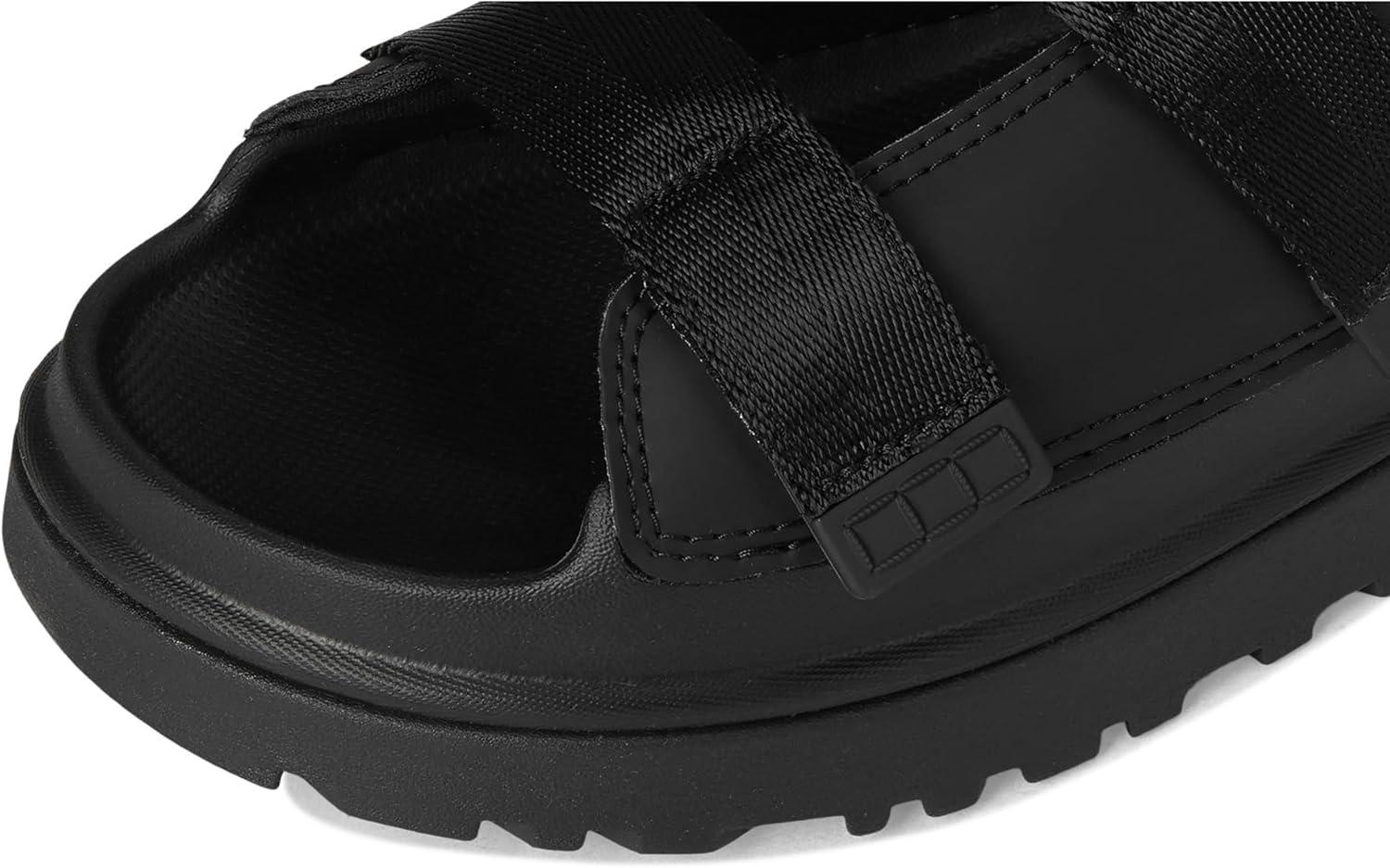 imageUGG UnisexChild Goldenglow Slide ToddlerLittle Big Kid SandalBlack