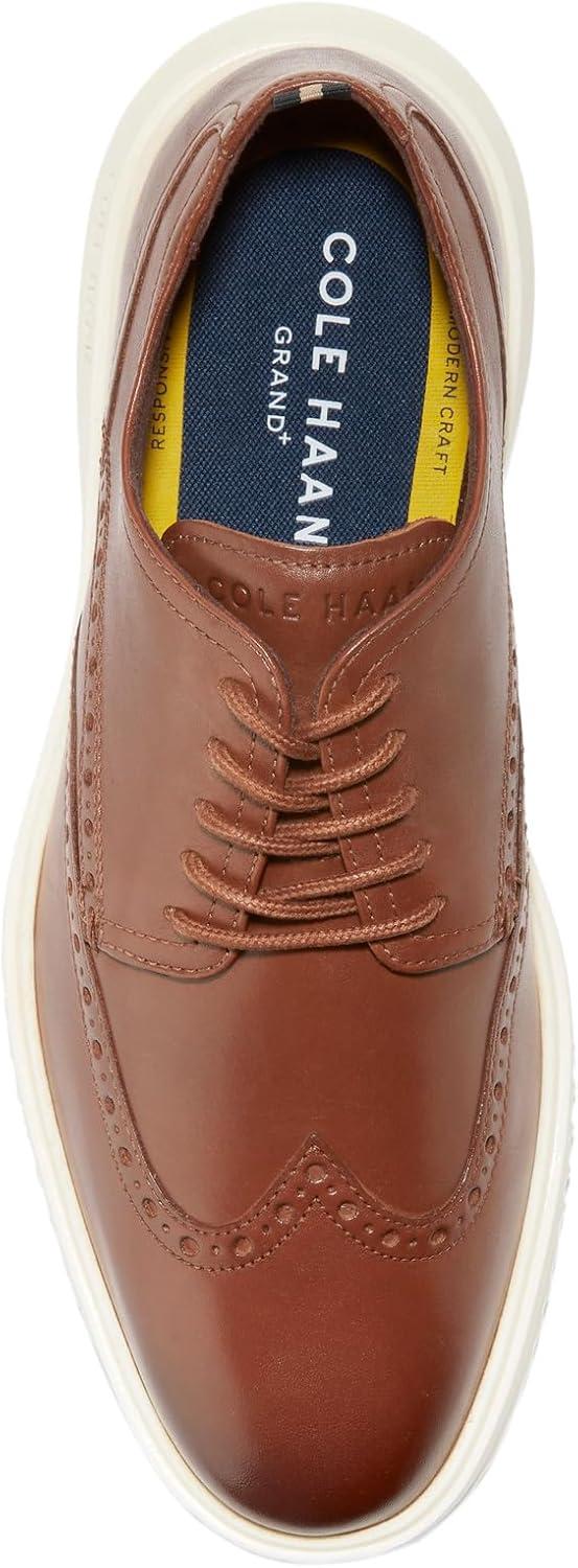 imageCole Haan Mens Great Jones Wingtip OxfordBritish TanIvory