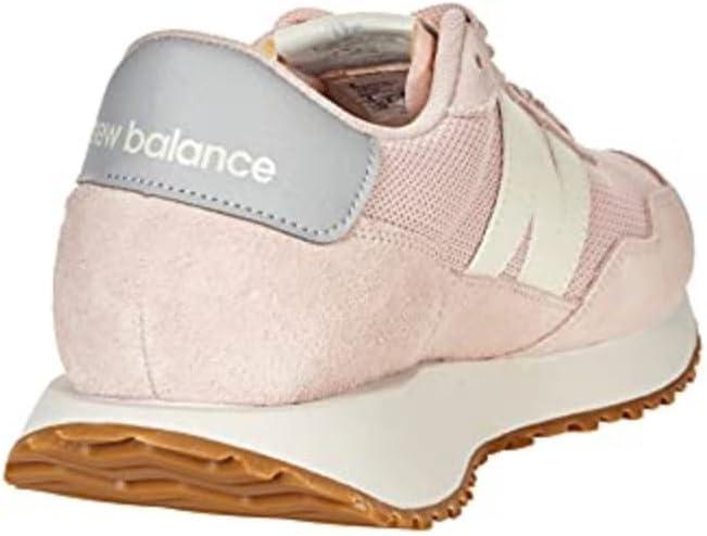 imageNew Balance Womens 237 V1 SneakerOyster PinkStorm Blue