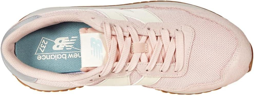 imageNew Balance Womens 237 V1 SneakerOyster PinkStorm Blue