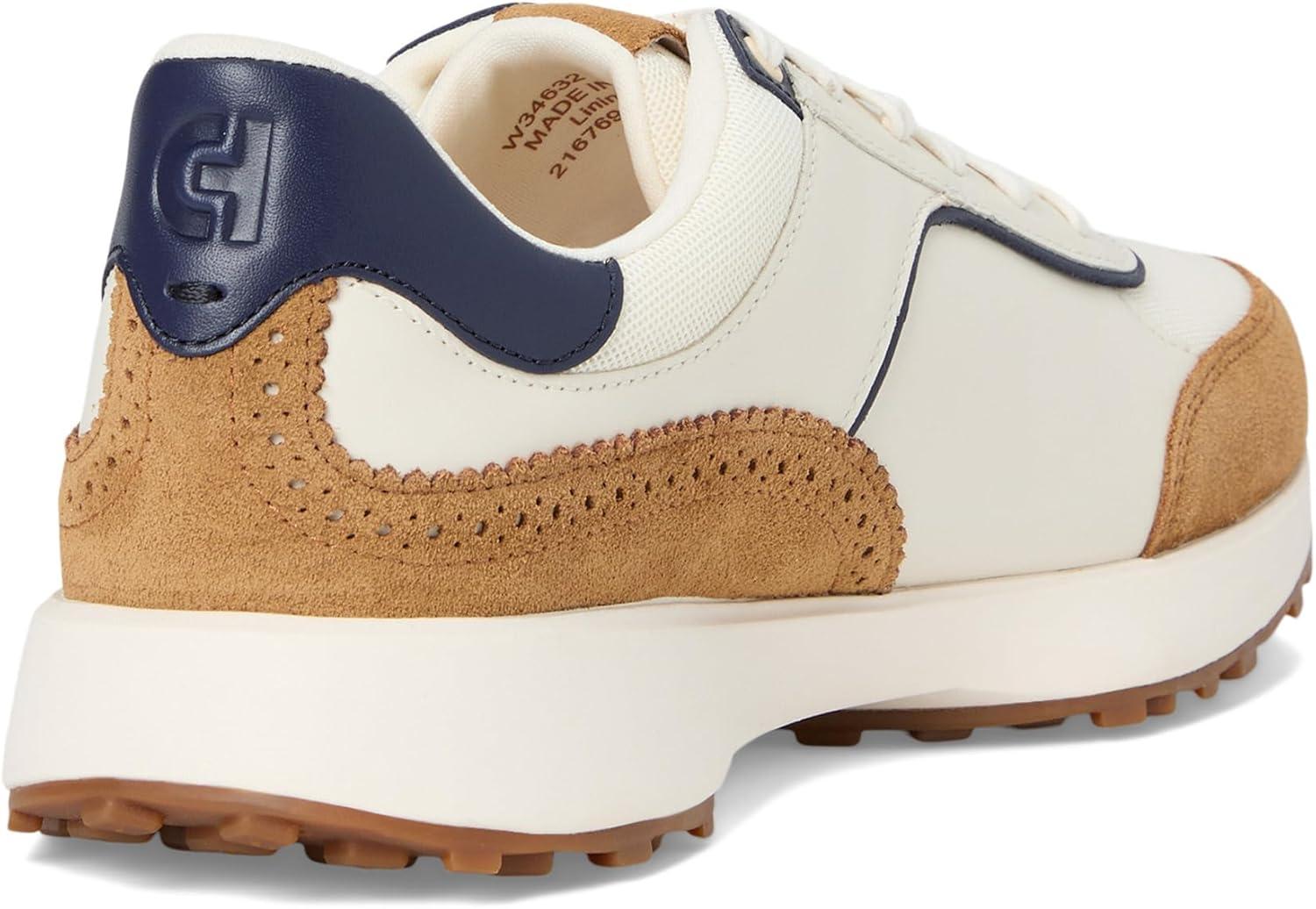 image:imageCole Haan Womens Grand Crosscourt Hallet Runners SneakerIvoryGolden Honey SuedeMidnight Moon