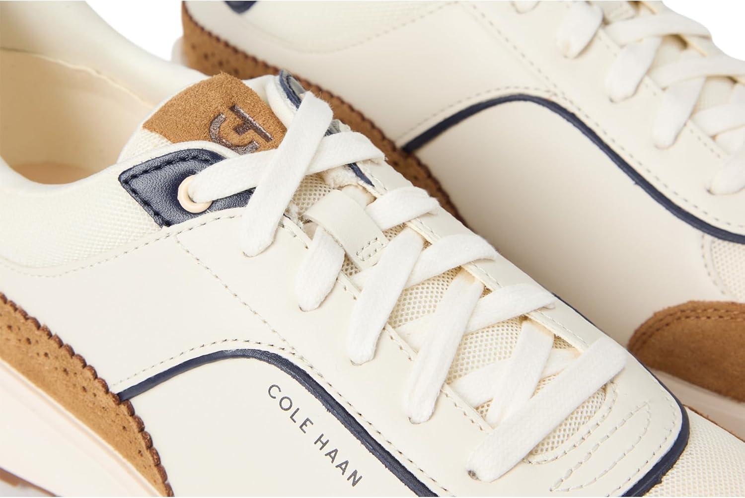 image:imageCole Haan Womens Grand Crosscourt Hallet Runners SneakerIvoryGolden Honey SuedeMidnight Moon