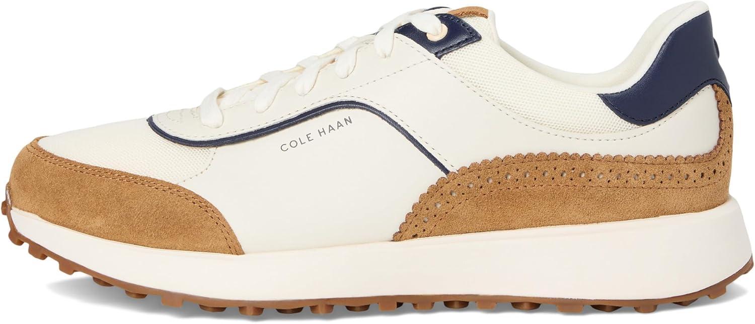 image:imageCole Haan Womens Grand Crosscourt Hallet Runners SneakerIvoryGolden Honey SuedeMidnight Moon