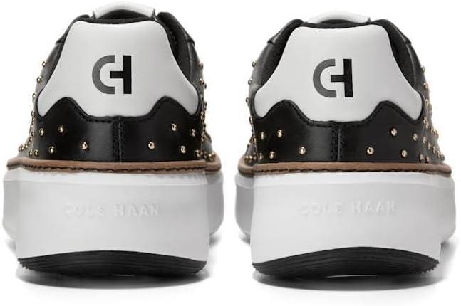 image:imageCole Haan Womens Grandpro Topspin SneakersBlack LeatherGold Studs