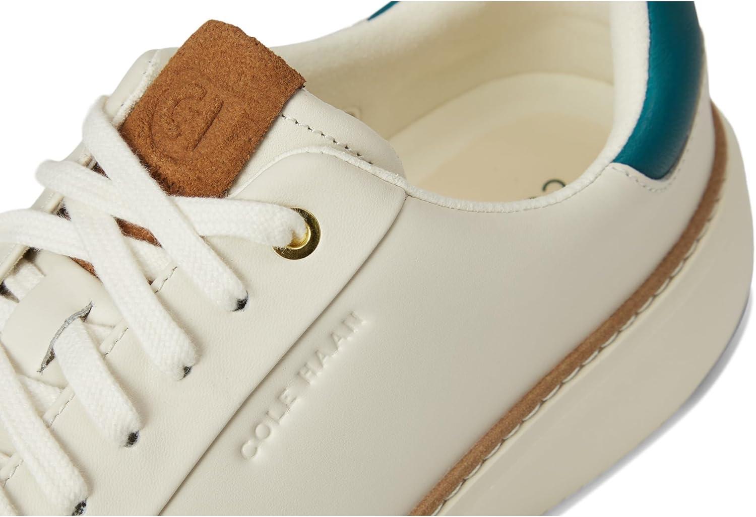 image:imageCole Haan Womens Grandpro Topspin SneakersIvory LeatherTealTobacco Suede