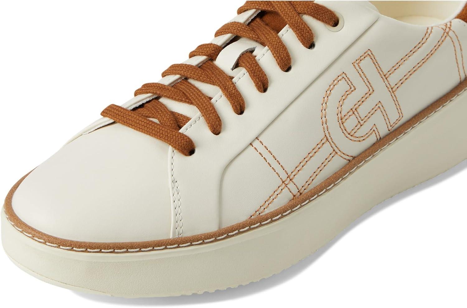 image:imageCole Haan Womens Grandpro Topspin SneakersIvory LeatherTobacco Suede