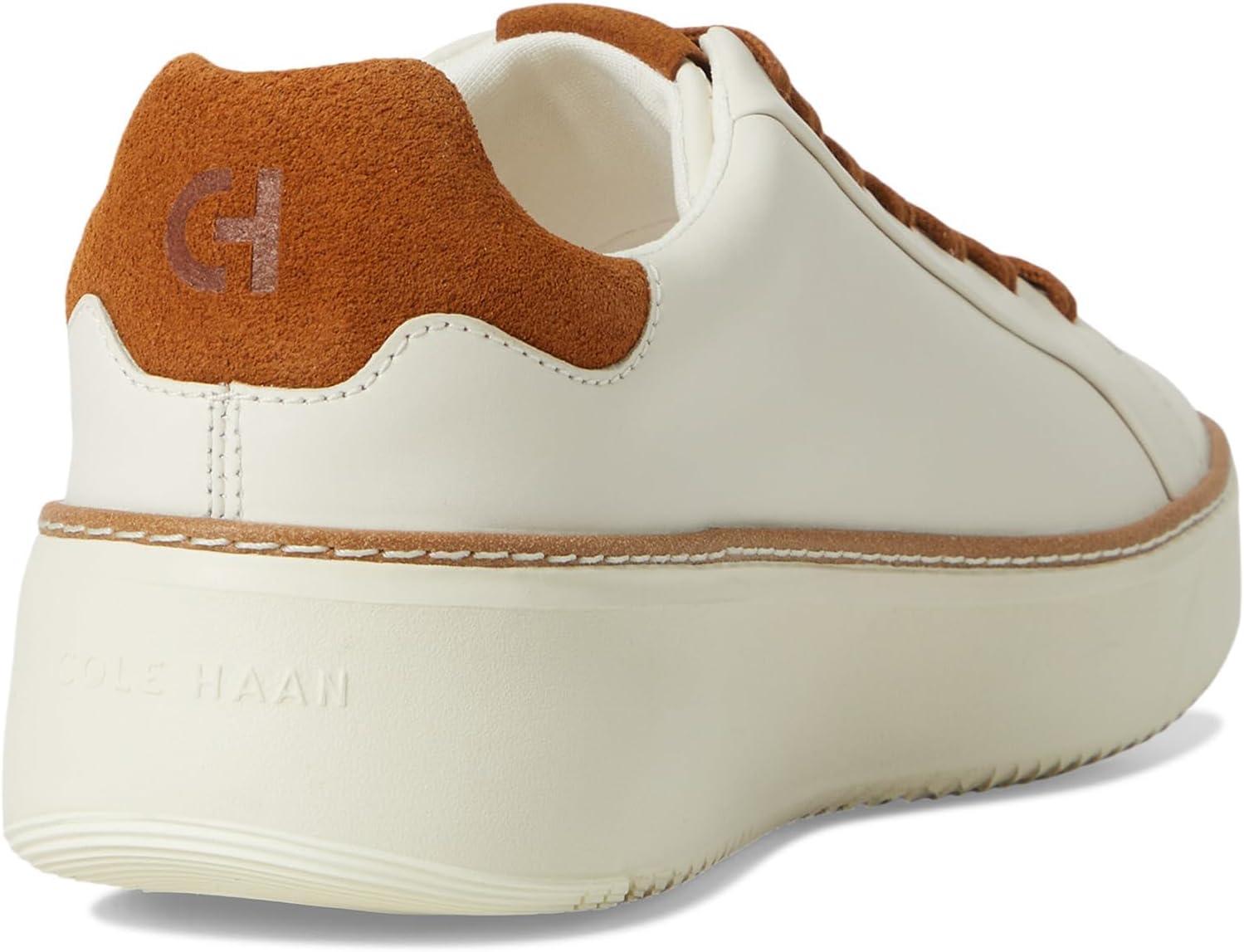 image:imageCole Haan Womens Grandpro Topspin SneakersIvory LeatherTobacco Suede