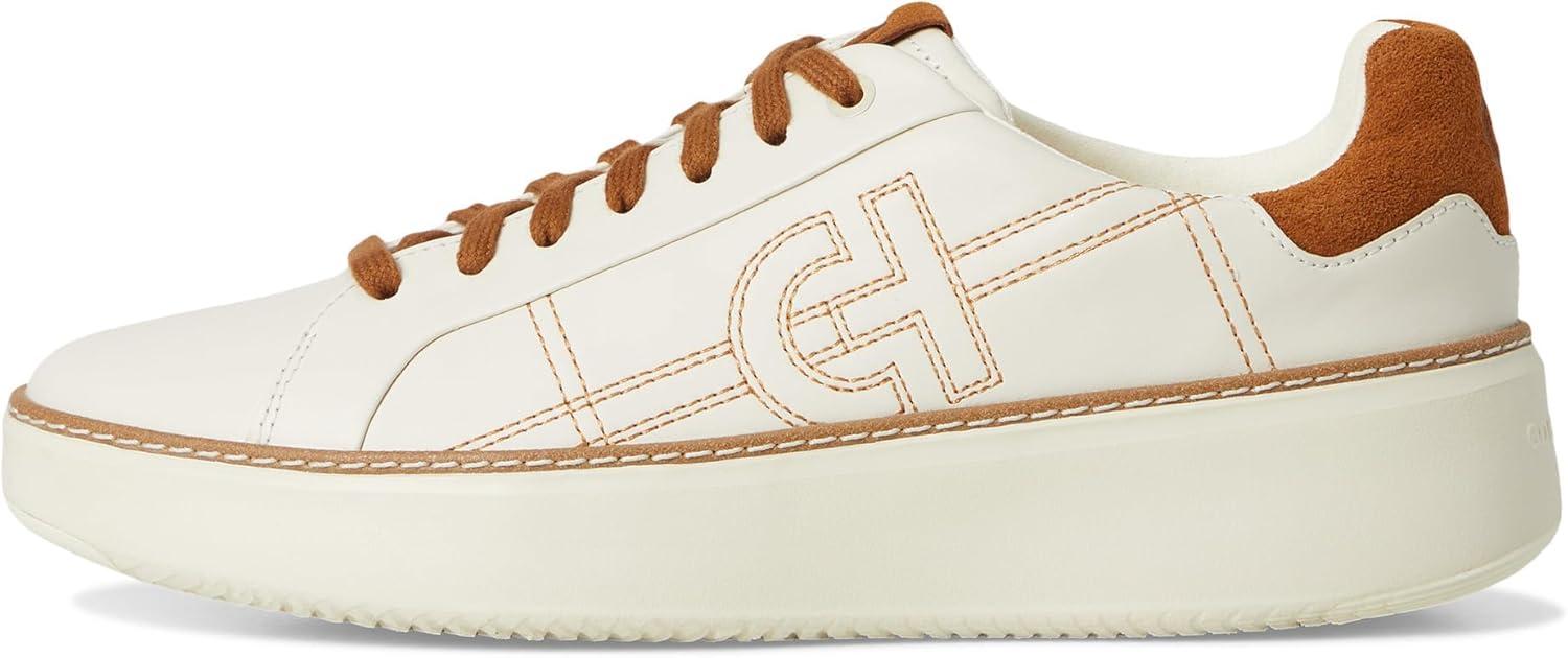 image:imageCole Haan Womens Grandpro Topspin SneakersIvory LeatherTobacco Suede