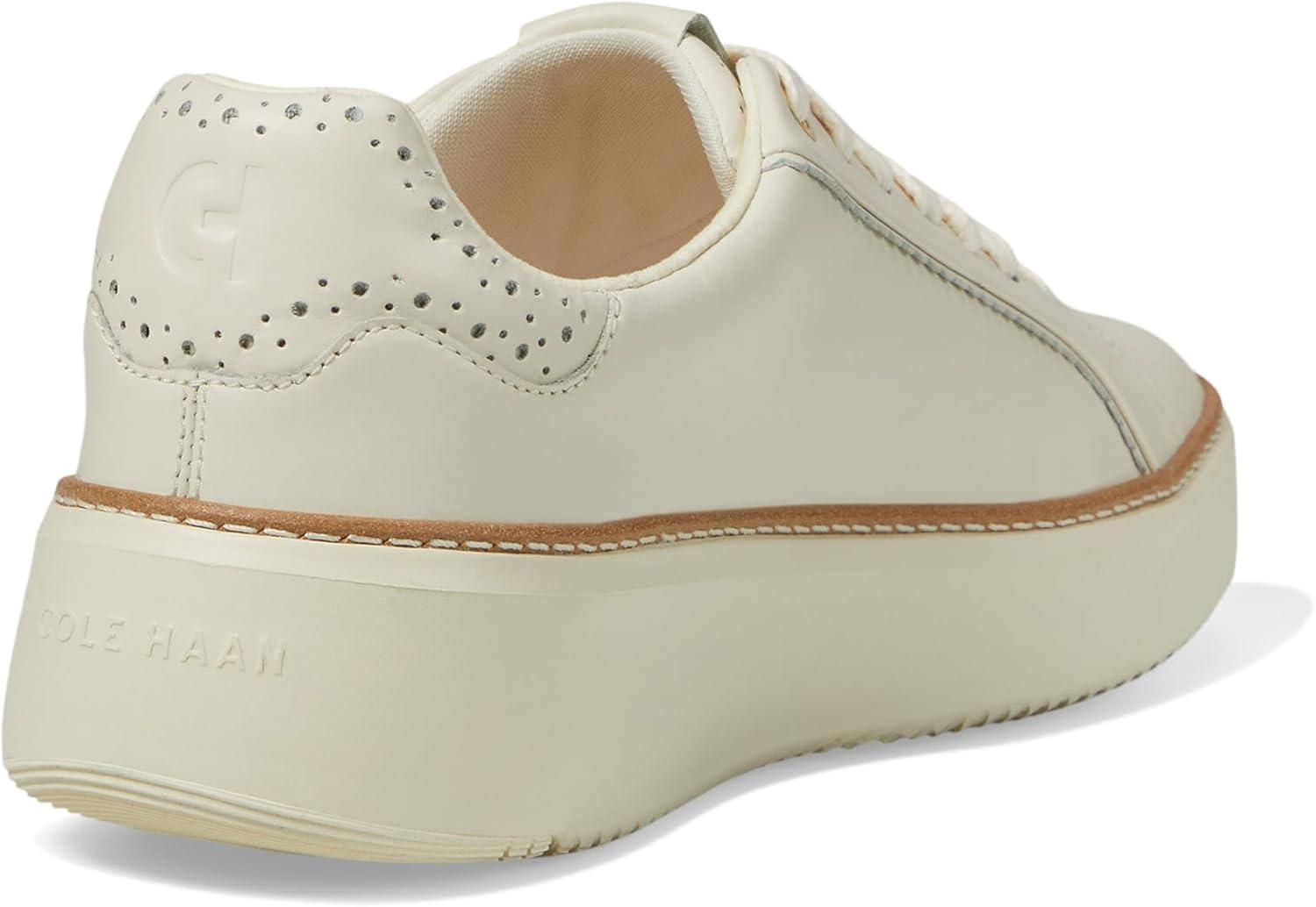 image:imageCole Haan Womens Grandpro Topspin SneakersIvory Perf Scallop