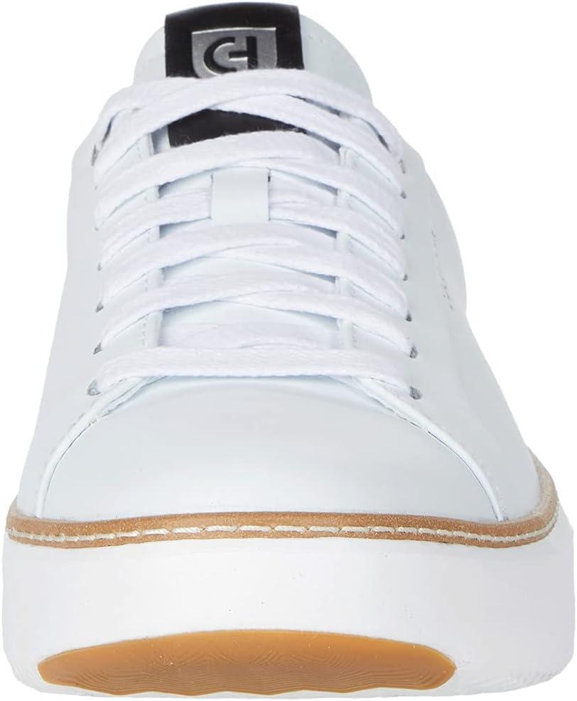 image:imageCole Haan Womens Grandpro Topspin SneakersIvoryBlack Leather