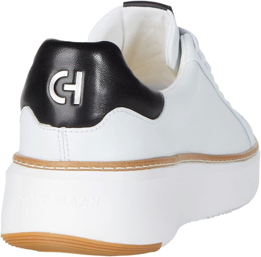 image:imageCole Haan Womens Grandpro Topspin SneakersIvoryBlack Leather