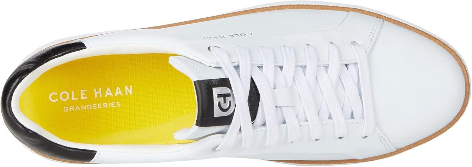 image:imageCole Haan Womens Grandpro Topspin SneakersIvoryBlack Leather