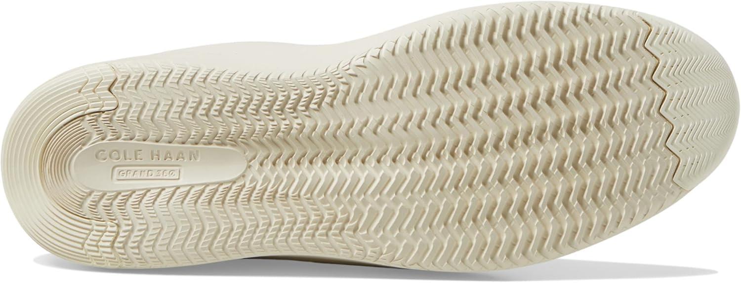 image:imageCole Haan Womens Grandpro Topspin SneakersIvoryBlack and Ivory Lizard Print