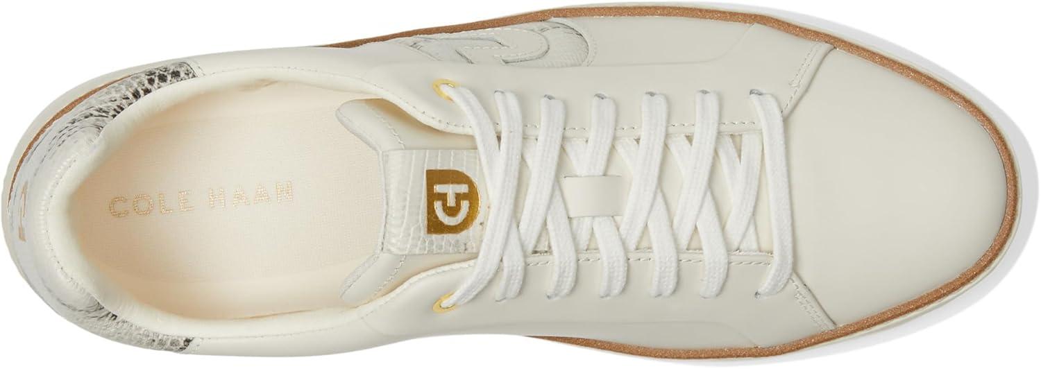 image:imageCole Haan Womens Grandpro Topspin SneakersIvoryBlack and Ivory Lizard Print