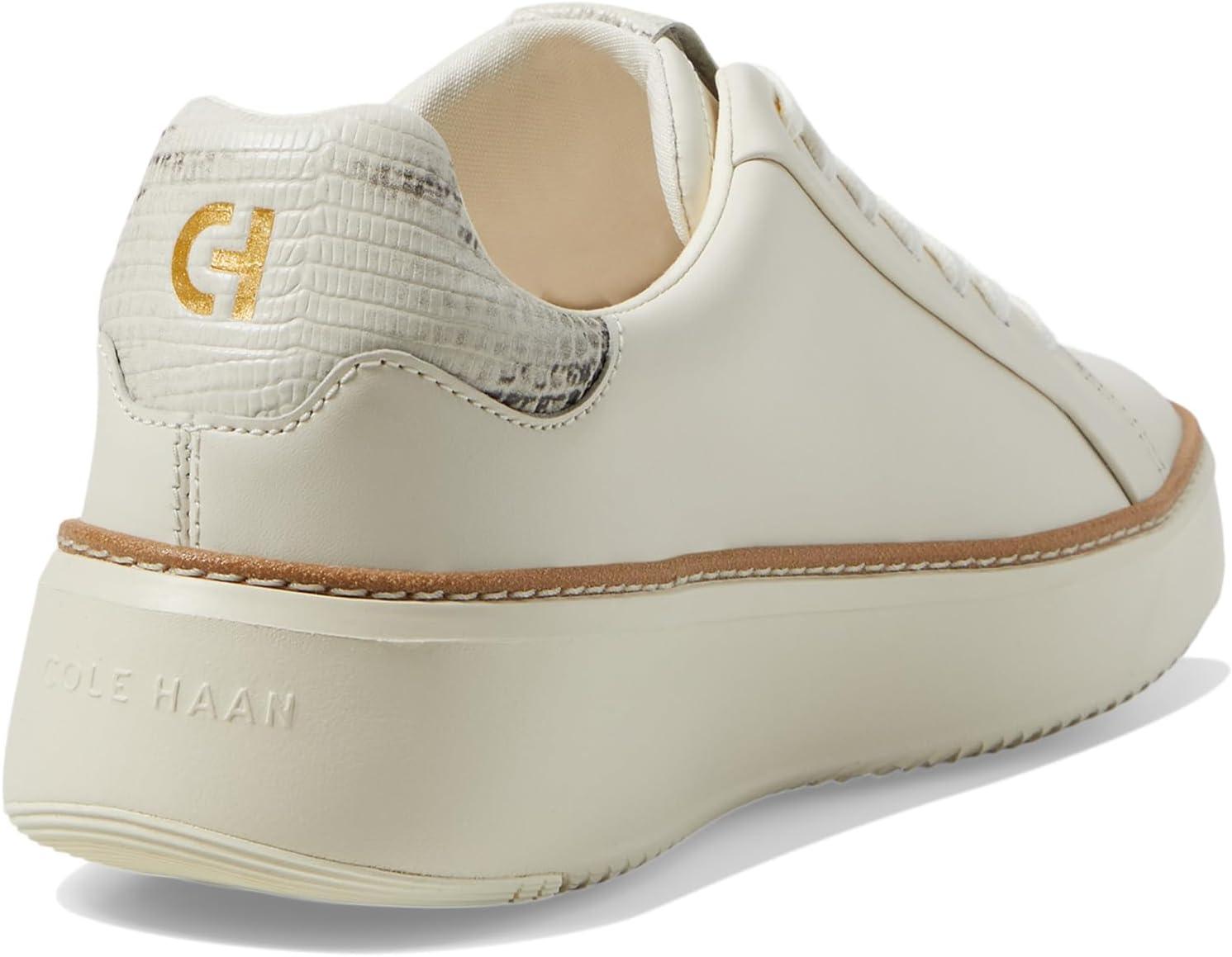 image:imageCole Haan Womens Grandpro Topspin SneakersIvoryBlack and Ivory Lizard Print