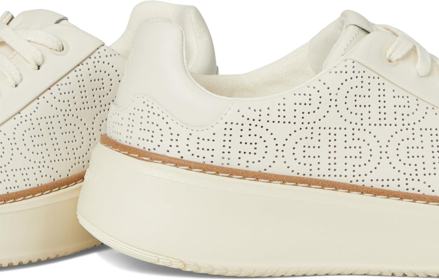 image:imageCole Haan Womens Grandpro Topspin SneakersIvoryPerforated Leather
