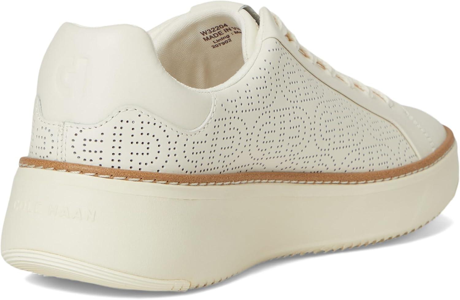 image:imageCole Haan Womens Grandpro Topspin SneakersIvoryPerforated Leather