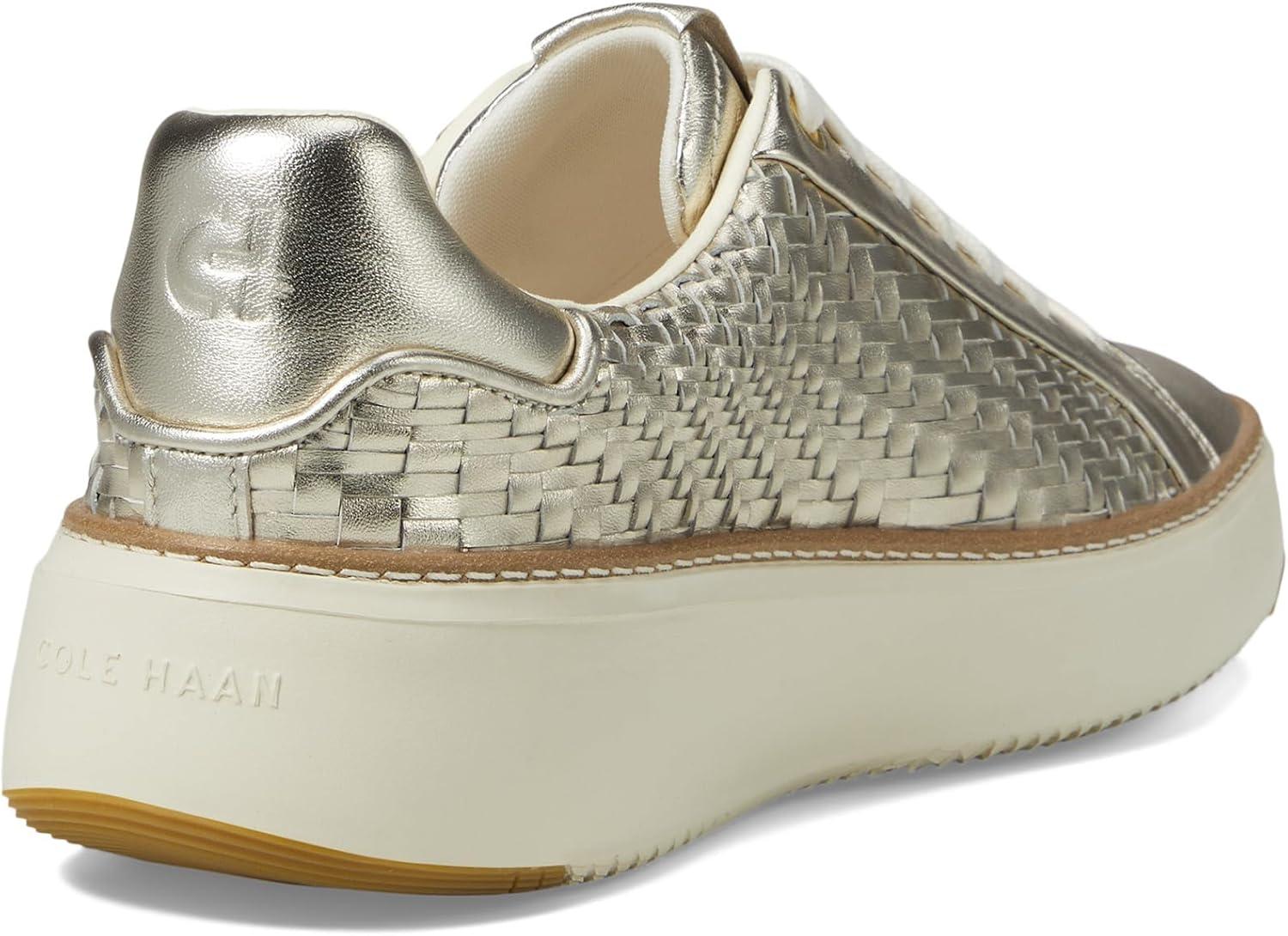 image:imageCole Haan Womens Grandpro Topspin SneakersSoft Gold Genevieve Woven LeatherIvory