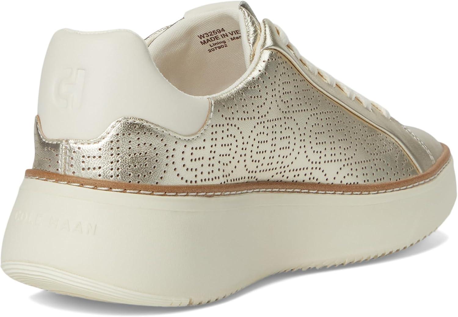 image:imageCole Haan Womens Grandpro Topspin SneakersSoft Gold MetallicPerforated Leather