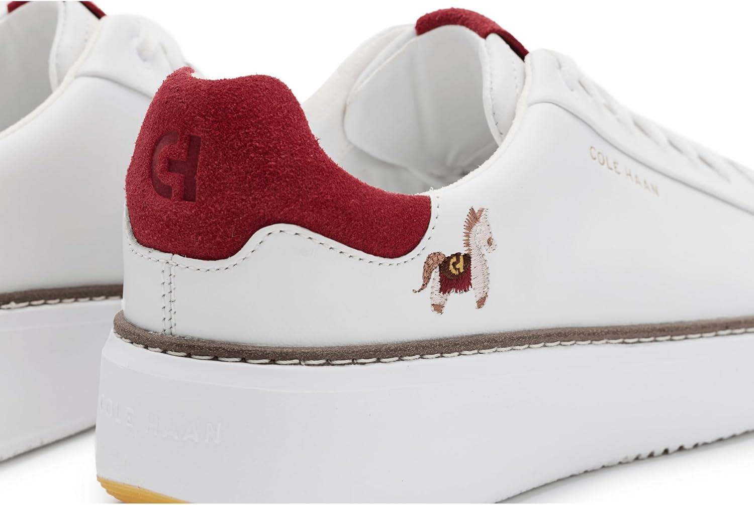 image:imageCole Haan Womens Grandpro Topspin SneakersWhiteRio Red Suede