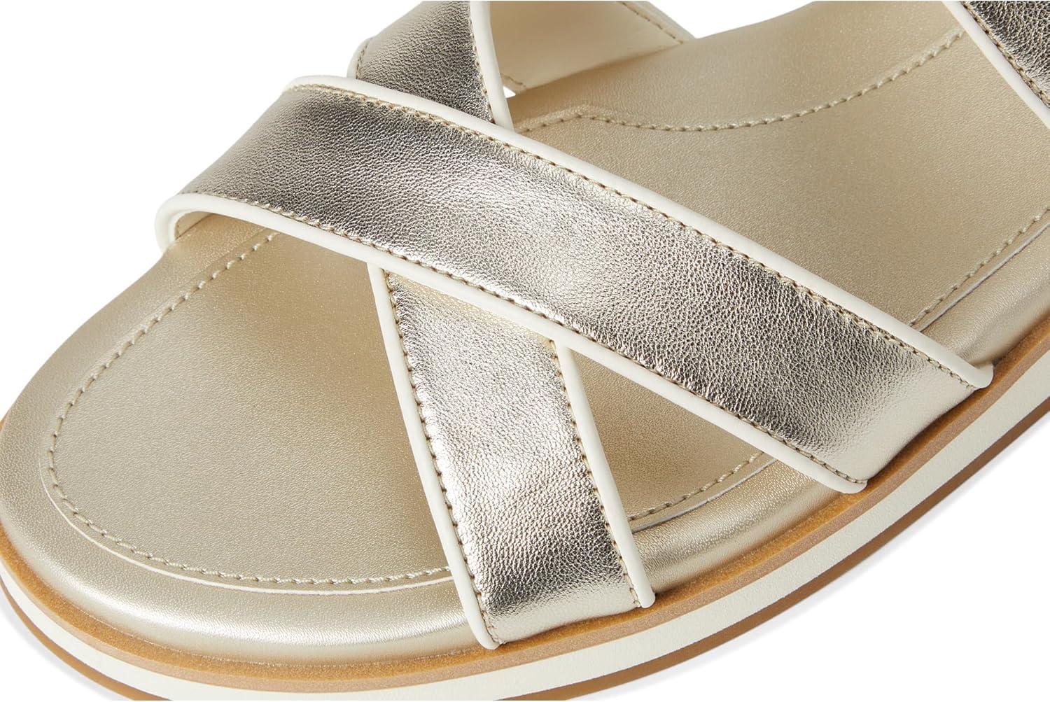 image:imageCole Haan womens Mirabelle Crisscross SandalsSoft Gold TalcaIvory