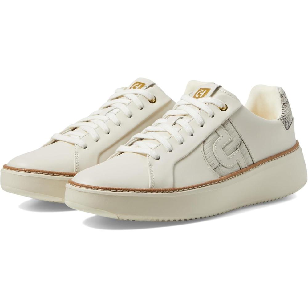 image:imageCole Haan Womens Grandpro Topspin SneakersIvoryBlack and Ivory Lizard Print