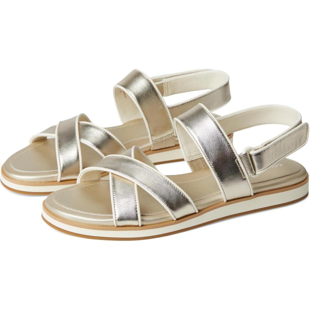 image:imageCole Haan womens Mirabelle Crisscross SandalsSoft Gold TalcaIvory